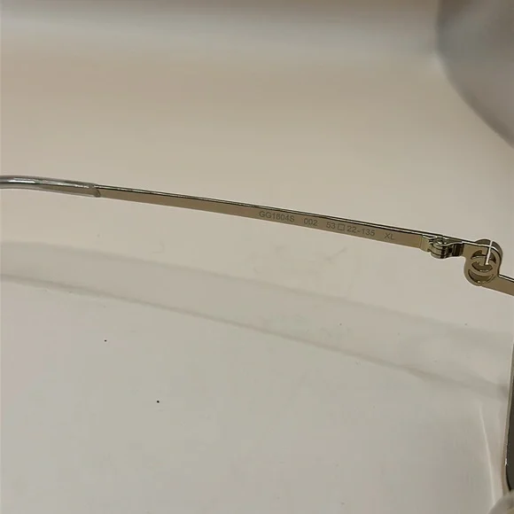 Gucci GG Upside Down Geometrical Sunglasses in Gold - Picture 9 of 9